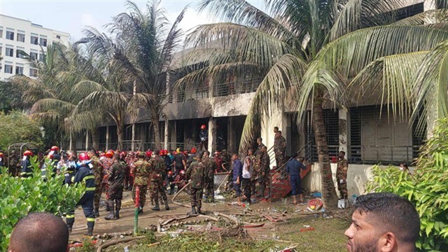 ‘A loud bang and then screams’: witnesses recall horror as jet hits Uttara school